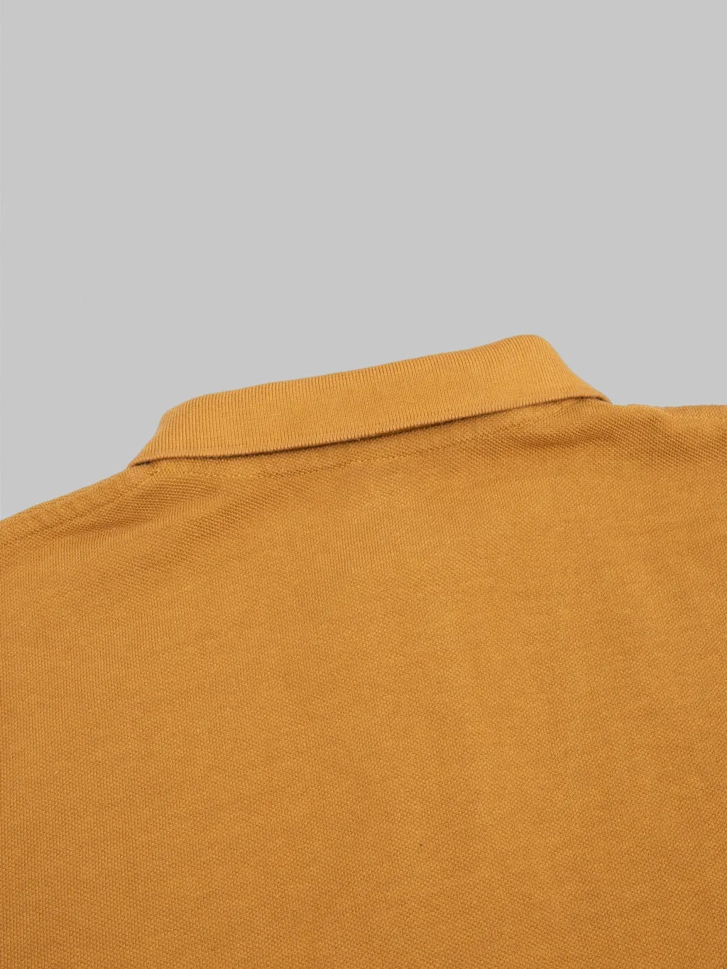 UES Polo Shirt Mustard